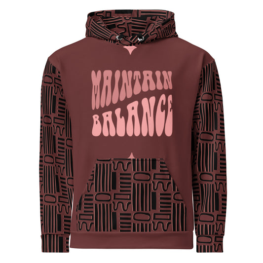 Front view of a maroon graphic print pullover hoodie with a pink wavy "Maintain Balance" graphic and a black geometric tribal pattern on the sleeves and kangaroo pocket| IslandWear Fashion