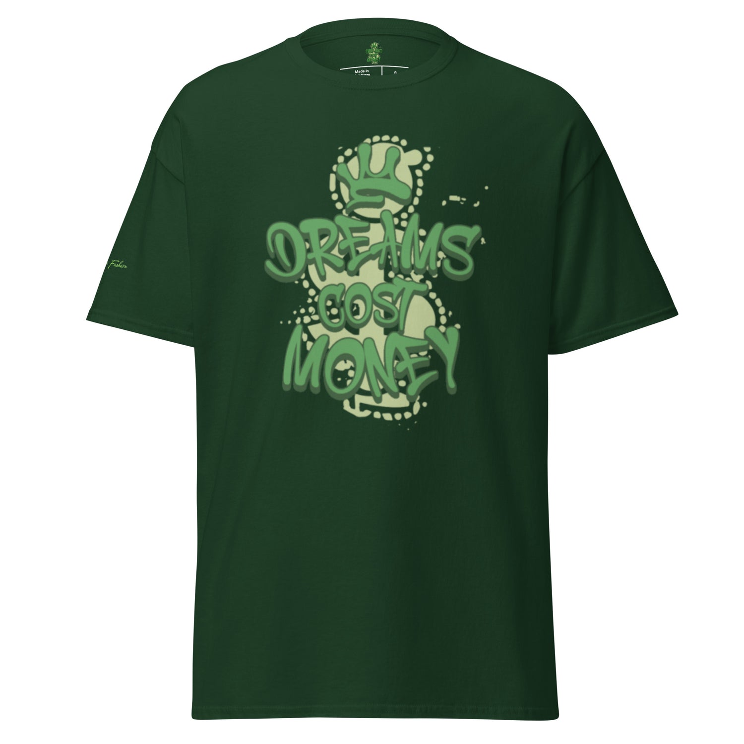 Forest green unisex t-shirt featuring a streetwear graphic that reads "Dreams Cost Money" in bold, textured light green letters, overlaid on a faded money sign symbol. The design has white splatter accents.