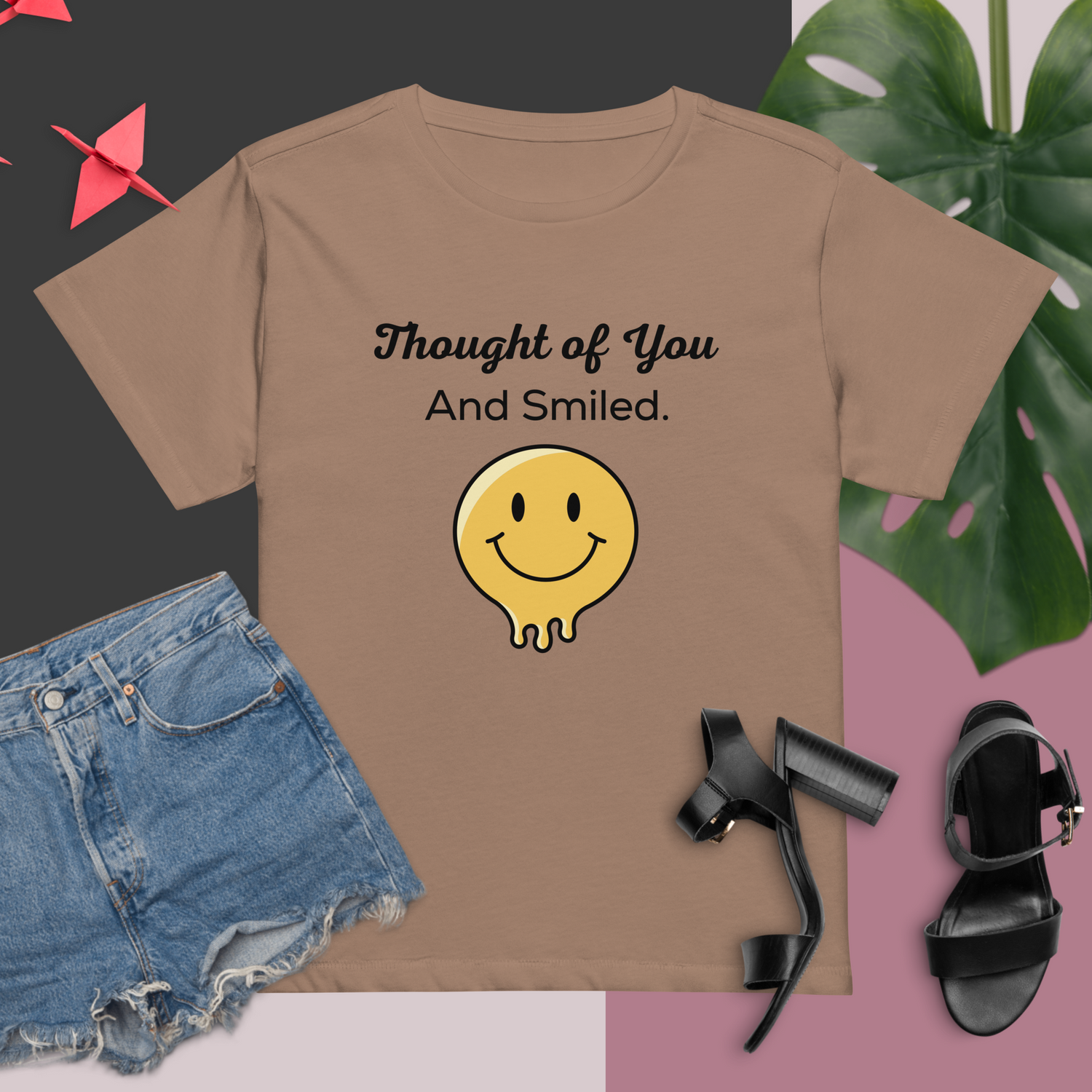 Brown t-shirt with the text "Thought of You And Smiled." above a yellow, black-outlined, melting smiley face graphic |IslandWear Fashion 