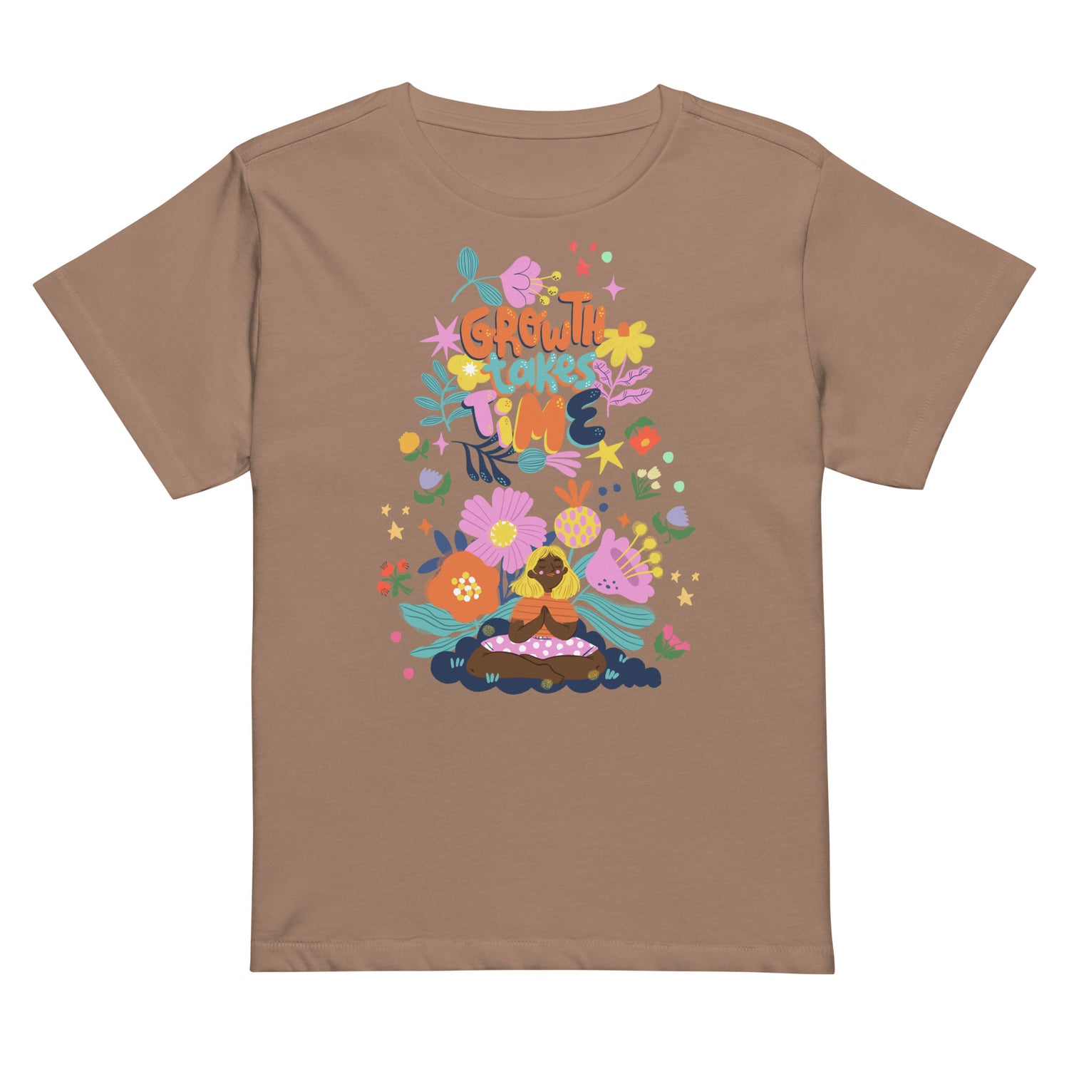 Brown/Latte t-shirt with a colorful boho-floral graphic and the phrase "Growth Takes Time." Design shows a person meditating surrounded by flowers and stars.
