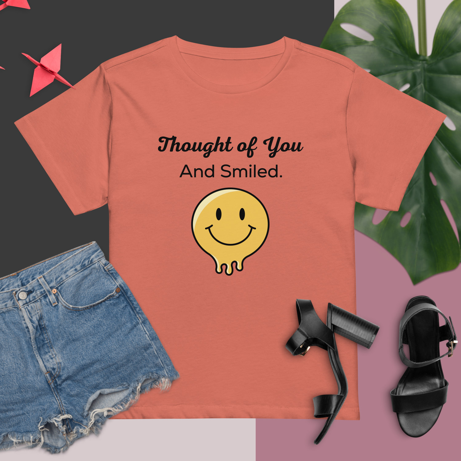 Burnt orange t-shirt with the text "Thought of You And Smiled." above a yellow, black-outlined, melting smiley face graphic | IslandWear Fashion 